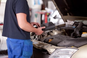 Mechanic with Diagnostic Equipment